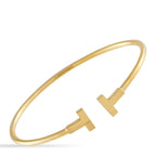 Tiffany & Co.Tiffany & Co. 18K Yellow Gold T Bracelet TI07-102025 – This iconic Tiffany & Co