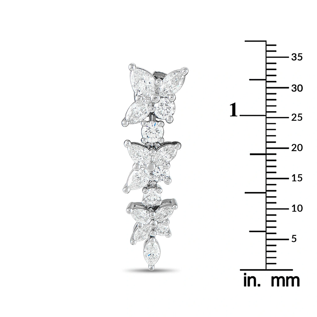 Tiffany & Co. Victoria diamond drop earring beside a measurement scale