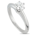 Platinum solitaire ring with round diamond center and four-prong setting