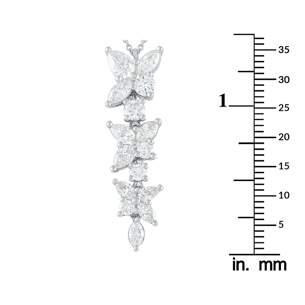 Tiffany & Co. Victoria diamond pendant with three floral motifs and a marquise-cut drop, shown with scale