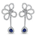 Clip-on flower earrings in white gold with diamond hoops and blue sapphire drop