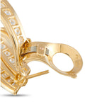 Yellow gold diamond hoop earring hinge and clasp, close-up