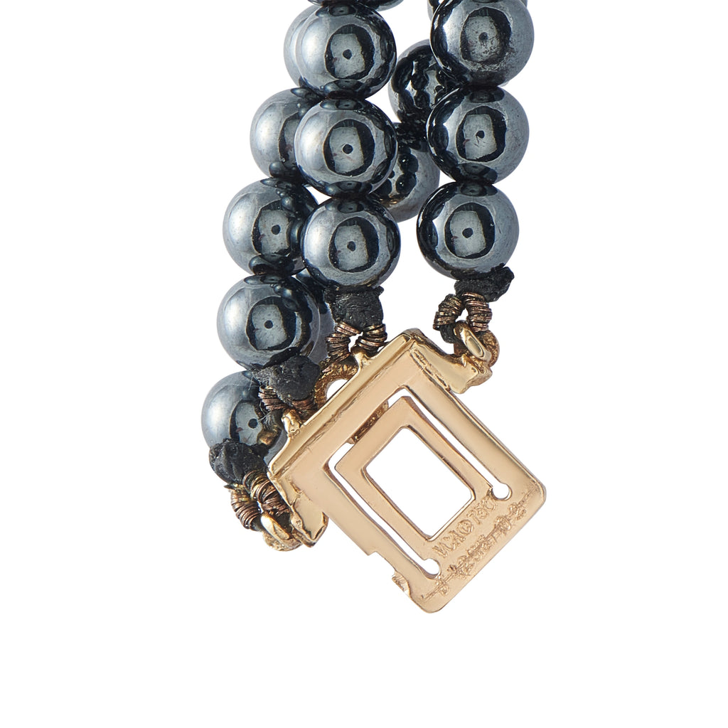 Hematite bead necklace with a yellow gold rectangular clasp
