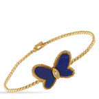 Van Cleef & ArpelsVan Cleef & Arpels Vintage Flying Beauties 18K Yellow Gold Diamond and Lapis Lazuli Butterfly Bracelet The essence of chic sophistication. This vintage Van Cleef & Arpels bracelet channels the free-spirited Flying Beauties aesth