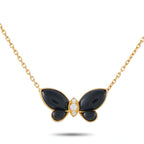 18K yellow gold butterfly pendant with onyx wings, diamond center, on chain