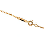 18K yellow gold chain clasp with heart pendant bail, close-up