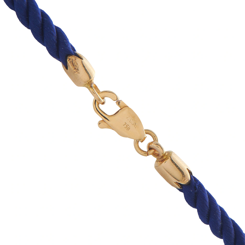 Gold clasp connector link on blue cord