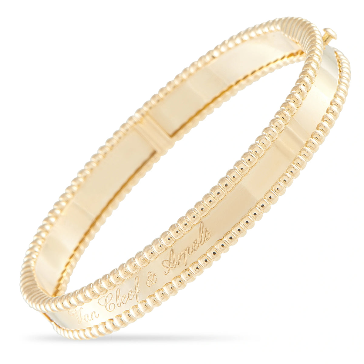 Van Cleef & Arpels yellow gold bangle with beaded edges and engraved inner band