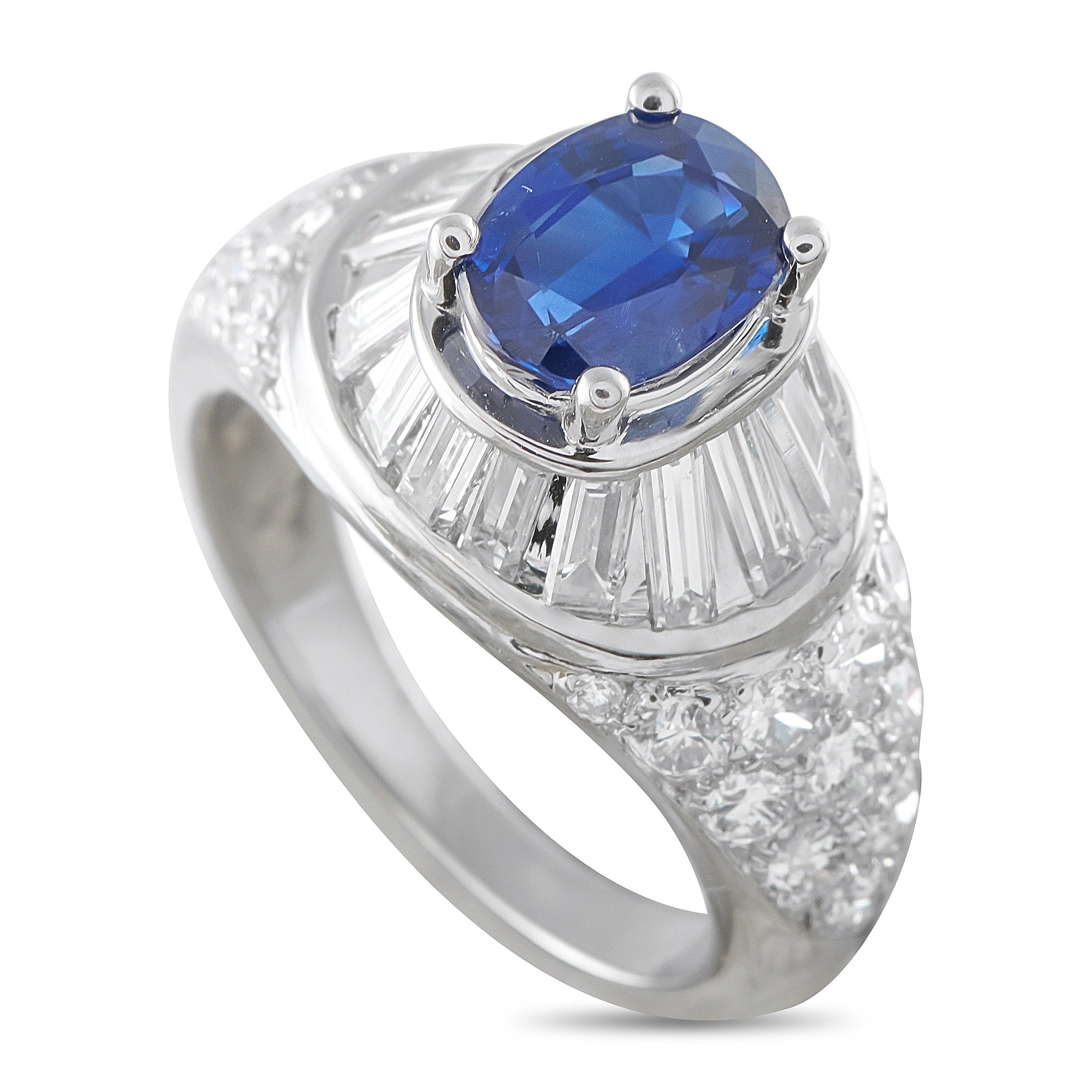 Van Cleef & Arpels platinum ring, angled view of oval blue sapphire and side diamond accents