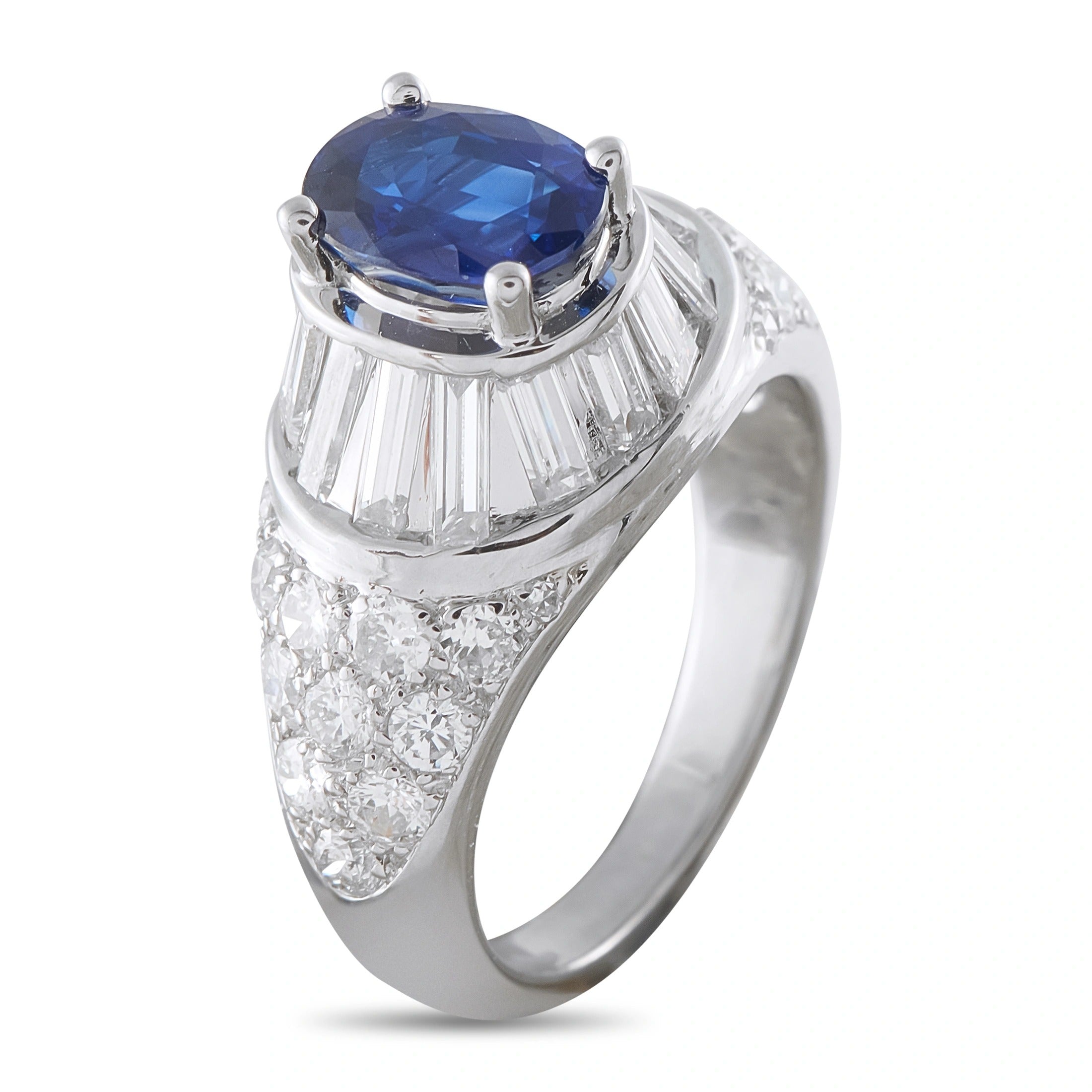 Van Cleef & Arpels platinum ring, oval blue sapphire center with baguette diamond shoulders