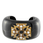 Black cuff bracelet with Maltese cross gemstone design in gold and white stones