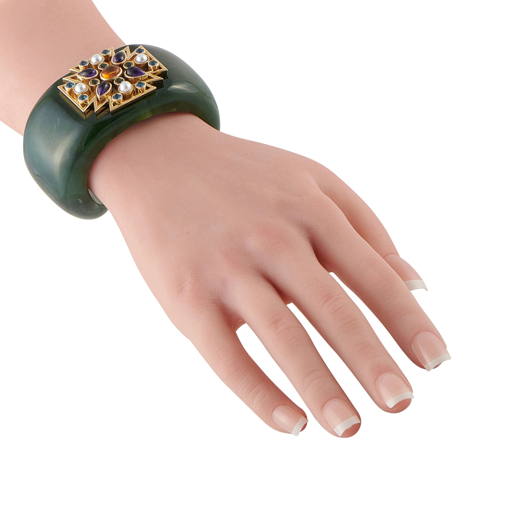 Verdura green nephrite cuff bracelet worn on hand; gold Maltese cross multi-gems
