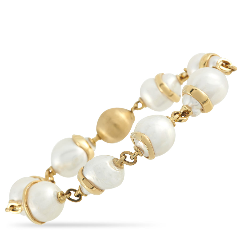 Yvel 18K Yellow Gold Baroque Pearl Bracelet – This Yvel bracelet strings together a series of baroque pearls chosen for their