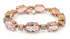 Rose gold morganite and diamond bracelet with oval stones and small diamond detailing