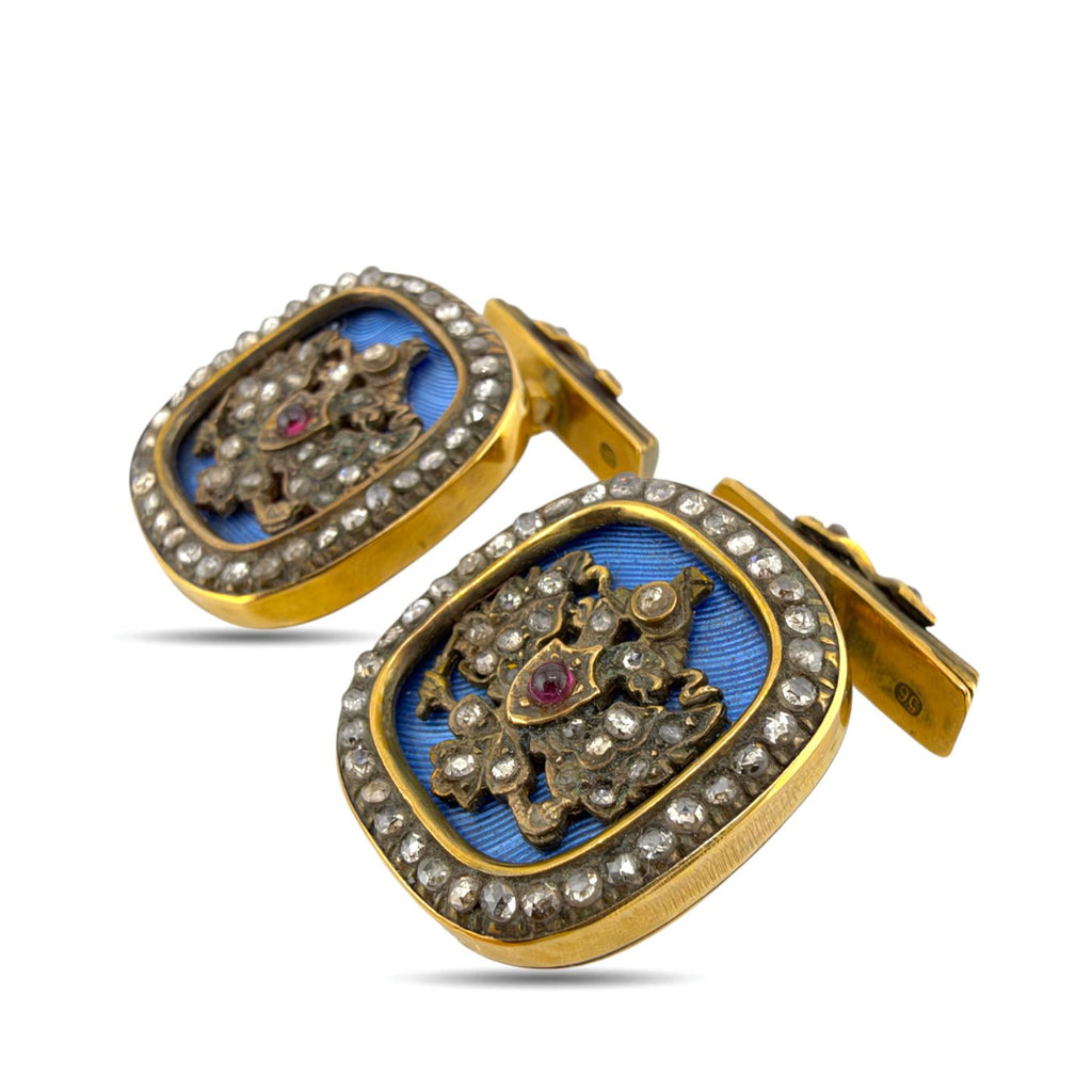 Faberge 14K yellow gold cufflinks with blue enamel, ruby, and diamond coat of arms