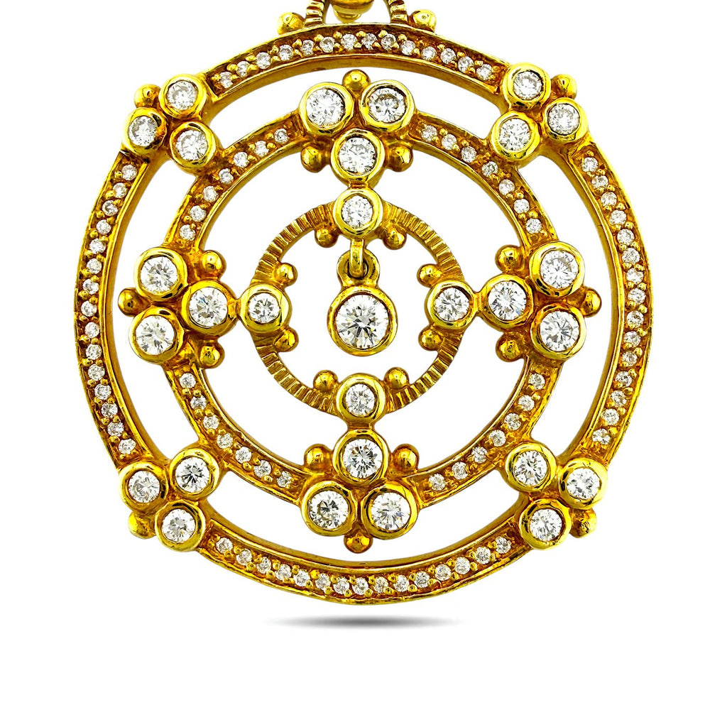 18K yellow gold circular brooch with round diamonds, openwork center, scalloped frame