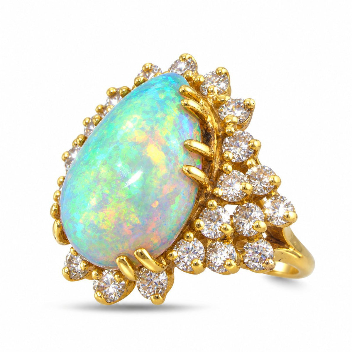 Yellow gold pear-shaped opal ring with diamond accents