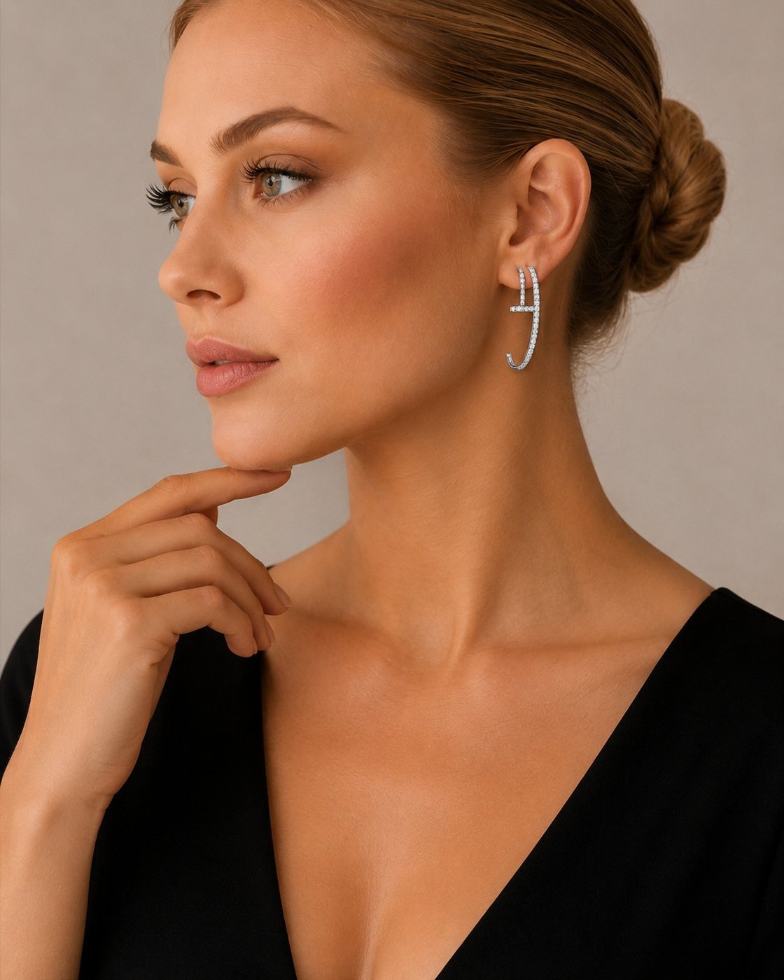 Cartier Juste un Clou white gold diamond hoop earrings worn on model