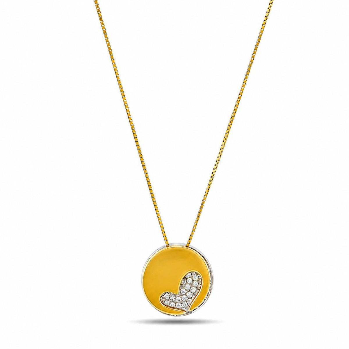 Two-tone gold heart pendant necklace with diamond accents and matching chain.