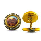 Scenic enamel cufflink face beside its gold chain fitting and diamond-set bar