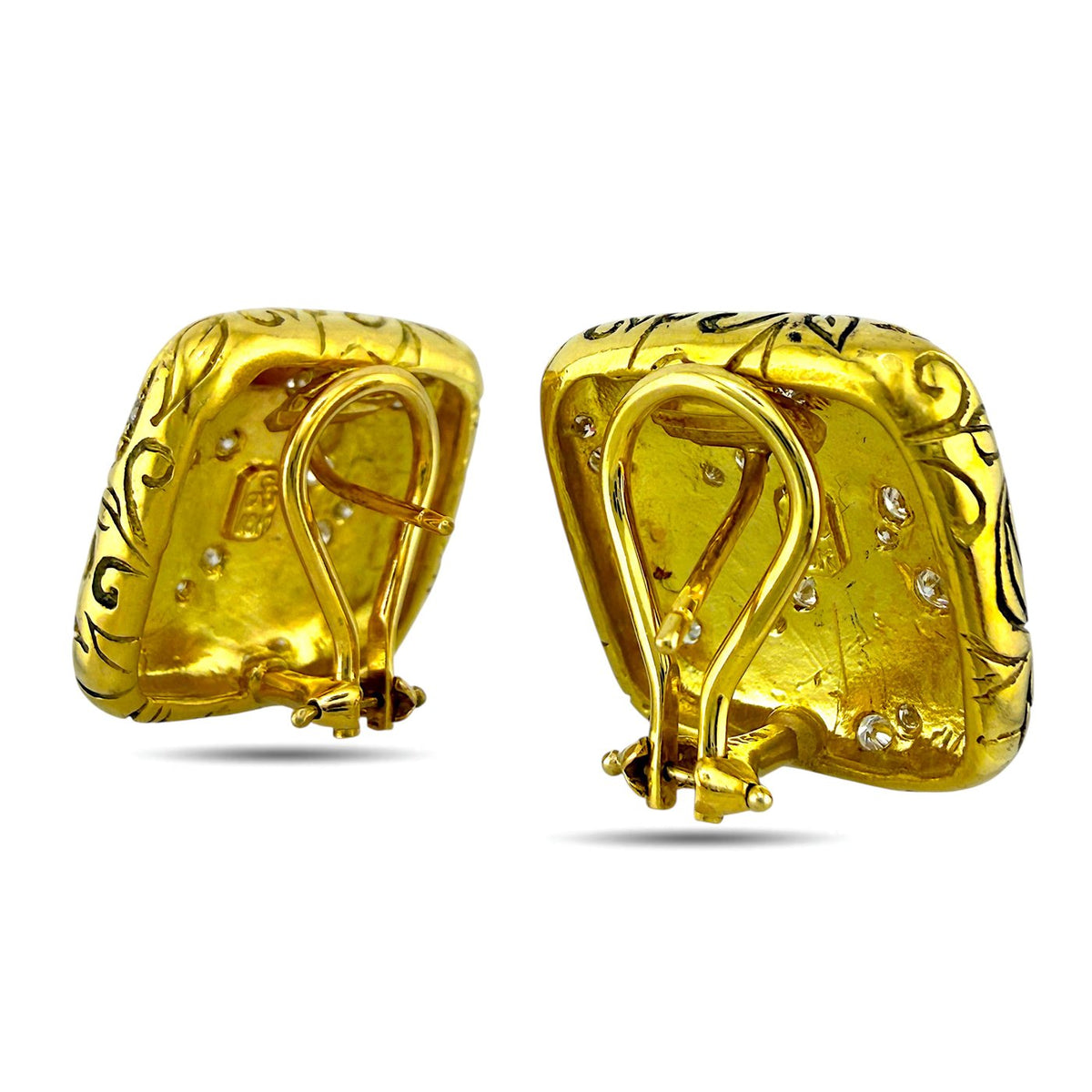 Back view of yellow gold square stud earrings with hinged clasp and diamond accents