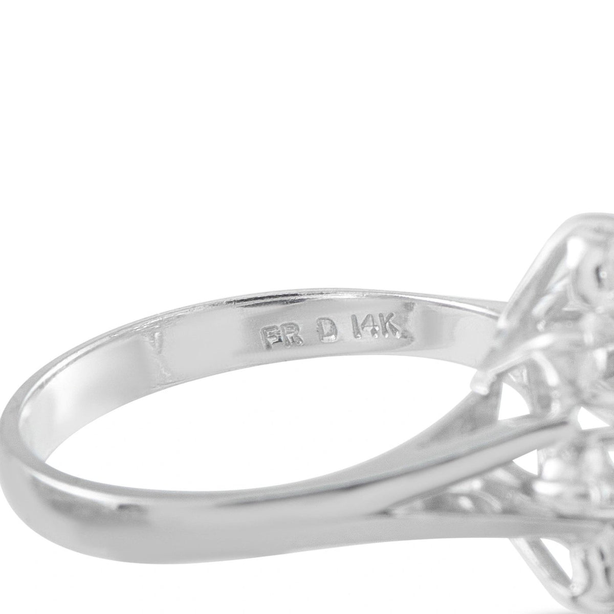 Inside band hallmark showing 14K on a white gold diamond cluster ring