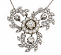 Rotating diamond halo necklace in white gold with ornate leaf settings