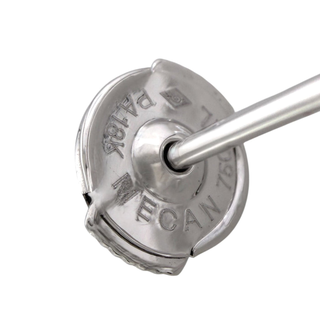 Close-up of white gold earring post and round back with diamond detailing.