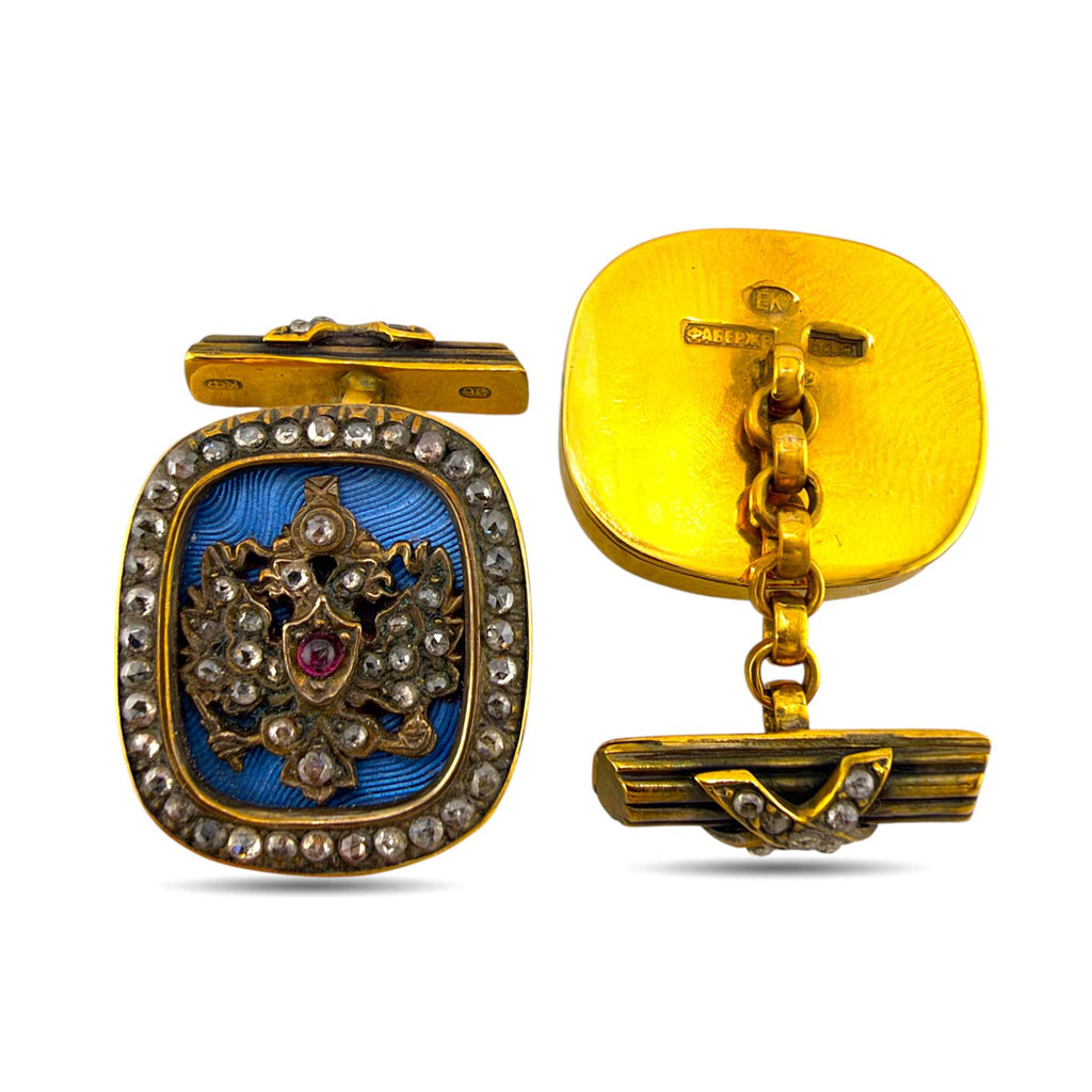 Faberge gold cufflinks with blue enamel crest, ruby center and diamond border, front and back
