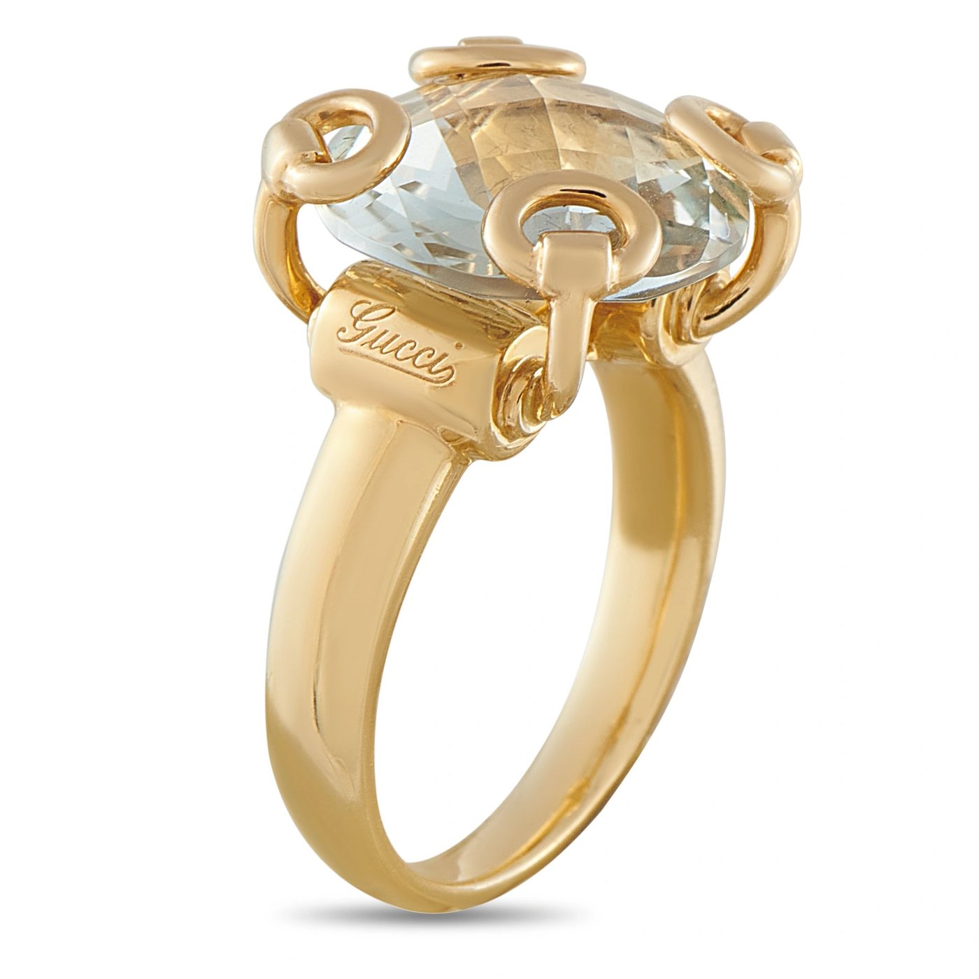 Yellow gold ring with oval clear stone, three horsebit-style mounts, Gucci engraving