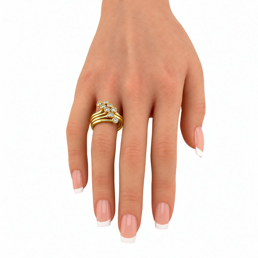 Sonia B. diamond swirl ring worn on a hand, showing its layered gold bands