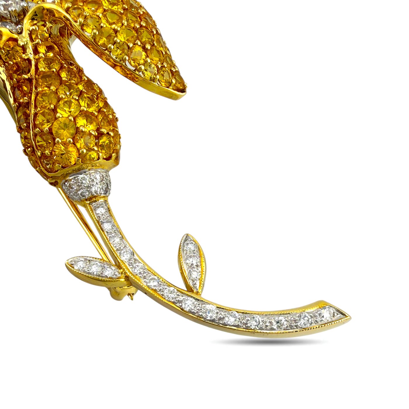 18K yellow gold flower brooch with citrine petals and diamond stem