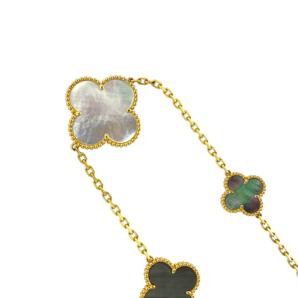 Gold clover pendant necklace with mother-of-pearl and onyx motifs and linked chain
