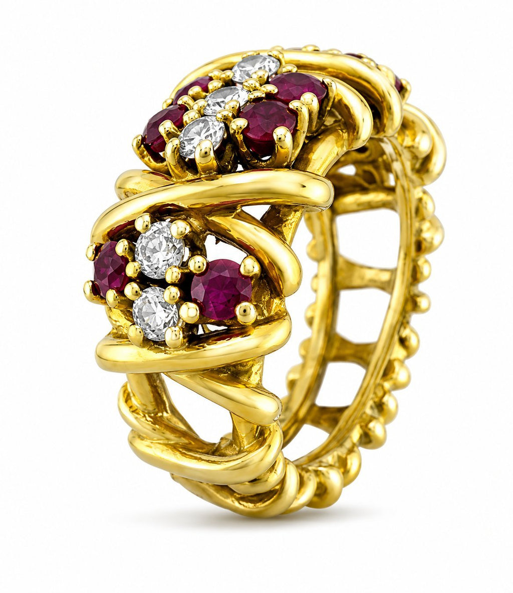 Gold hoop-style vintage ring with ruby and diamond clusters, side view