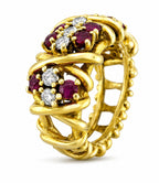 Gold hoop-style vintage ring with ruby and diamond clusters, side view