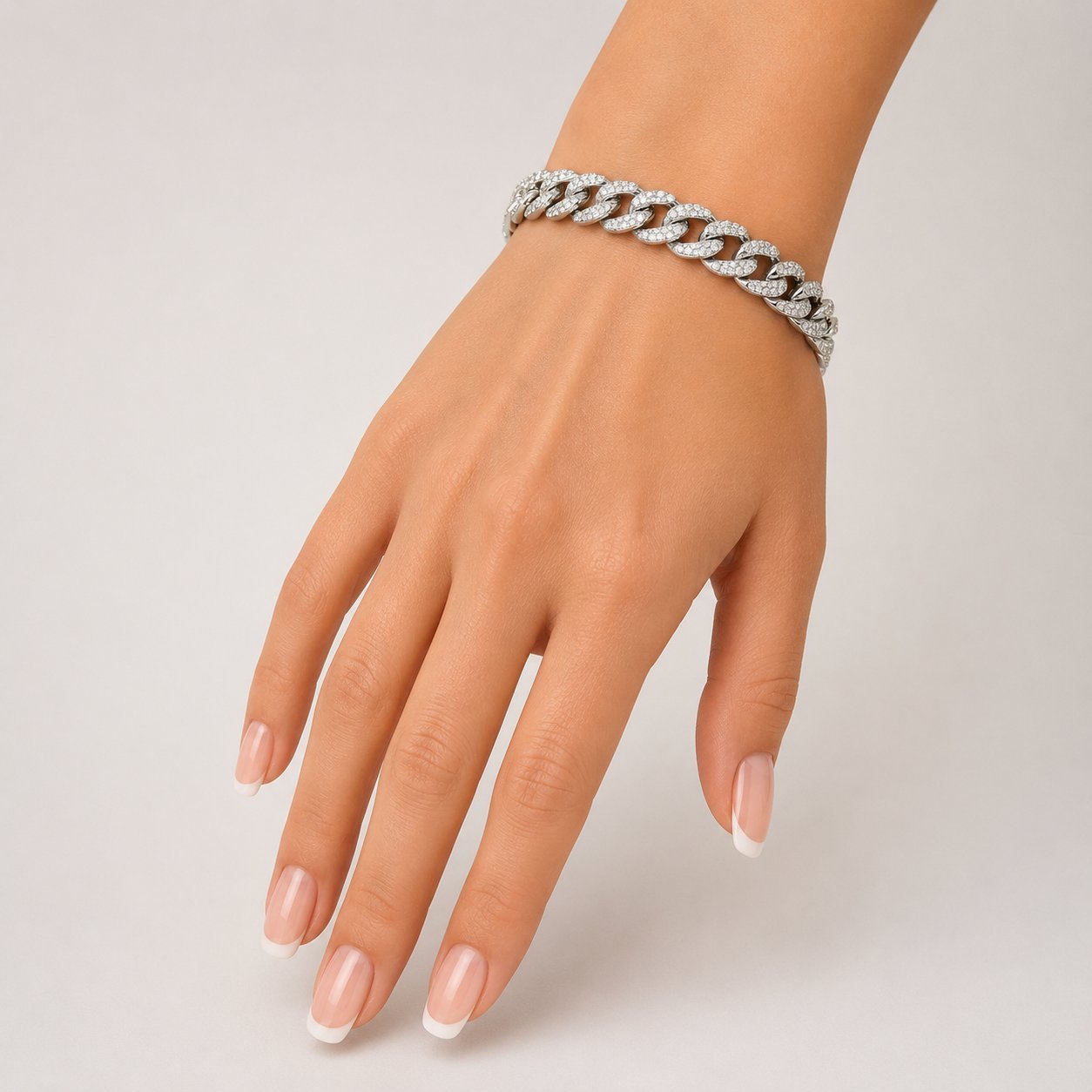 18K white gold diamond interlocking circle link bracelet on wrist