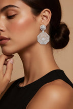 14K white gold octagon drop diamond earrings worn on model, geometric faceted drop