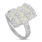 Platinum diamond ring angled view, yellow baguette center row with surrounding round stones