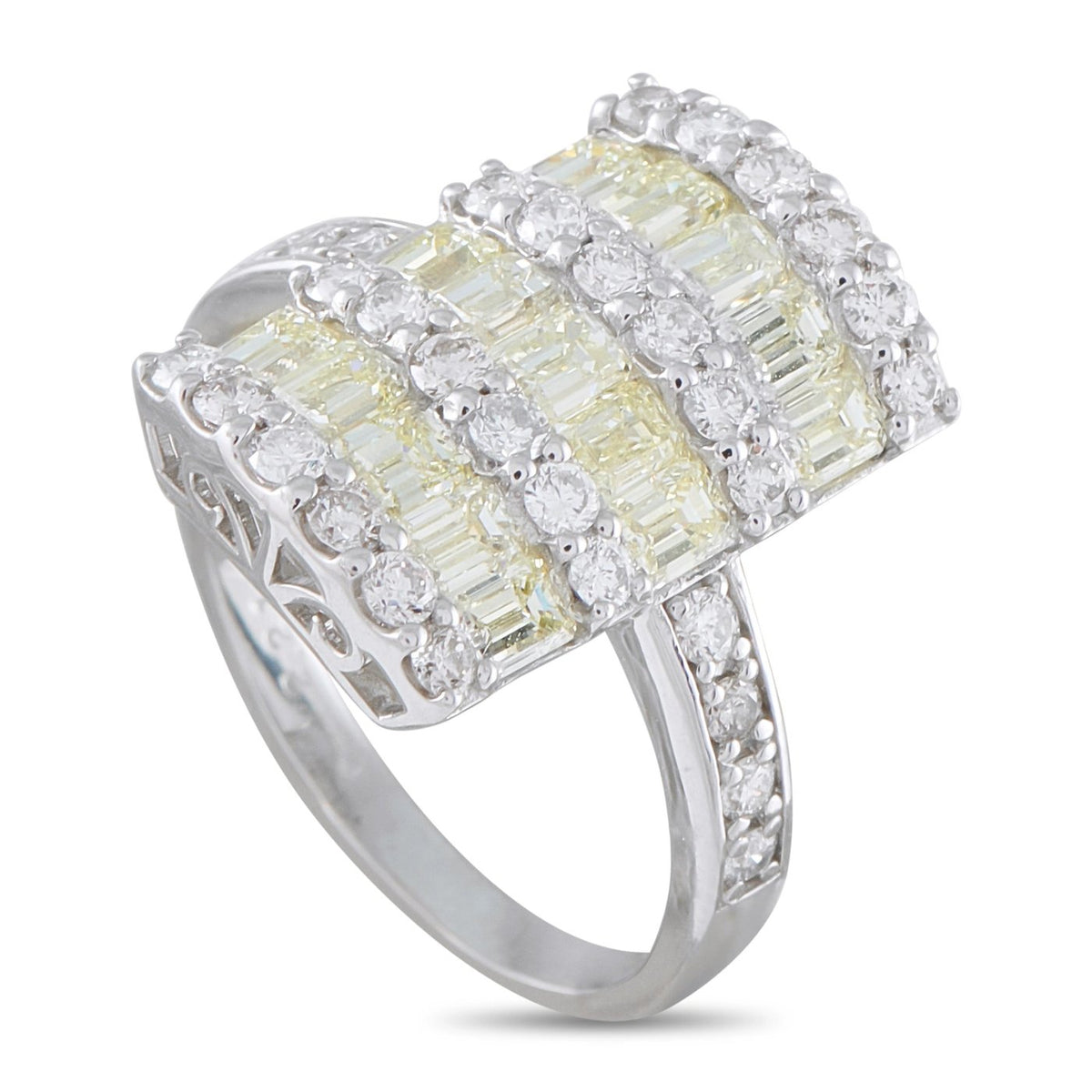 Platinum diamond ring angled view, yellow baguette center row with surrounding round stones
