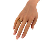 Gucci Running X 18K yellow gold diamond ring on a hand