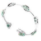 Exclusive Single Row 18K White Gold Diamond and Emerald Bangle