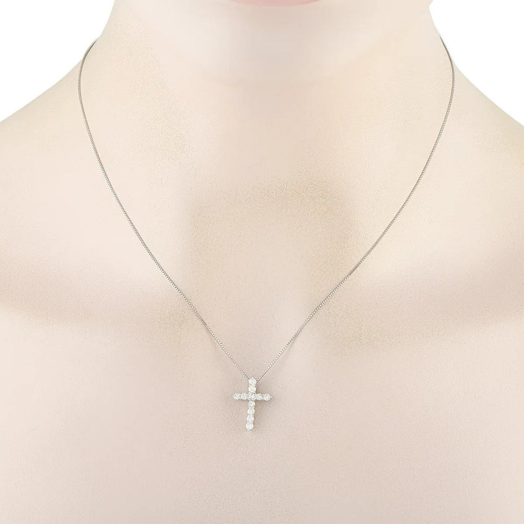Platinum diamond cross pendant necklace on bust