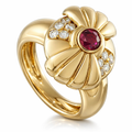 Gold flower ring with round red ruby center and diamond accents