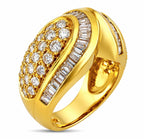 18K yellow gold diamond ring with faceted center and baguette side bands