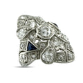 Platinum Art Deco style ring with diamond cluster and blue sapphire accent