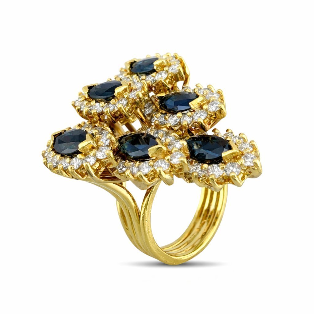18K yellow gold ring with layered oval blue sapphire stones and diamond accents, side view