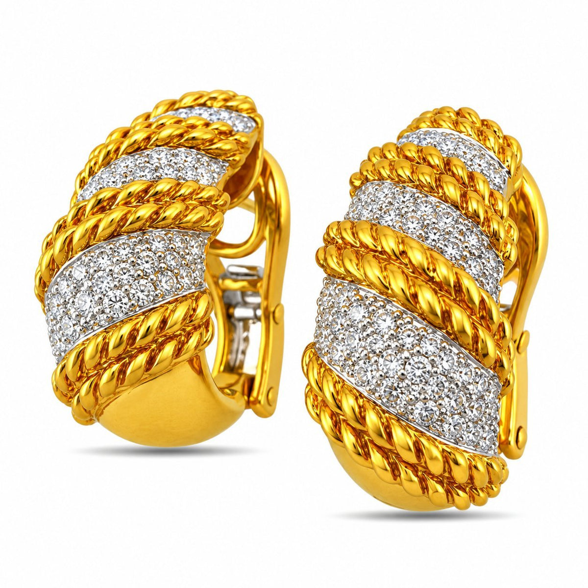 18K yellow gold swirl earrings with three rows of diamond pavé