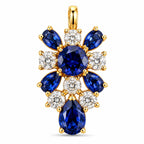 K. Faberge rose gold sapphire and diamond floral drop earring with blue center stones