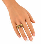 Ruby and diamond gold ring on fingers