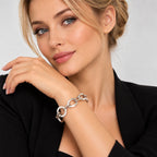White gold link bracelet worn on wrist, interlocking circle and oval links